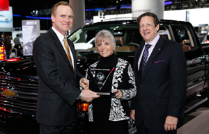 2014 Chevy Silverado named 2014 International Truck of the Year - Presented by Road & Travel Magazine editor Courtney Caldwell, and ICOTY sponsor, Mike Martini, president Bridgestone OE Americas in Detroit