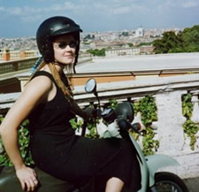 Amanda Castleman in Rome, braving Roman traffic on her rented moped.
